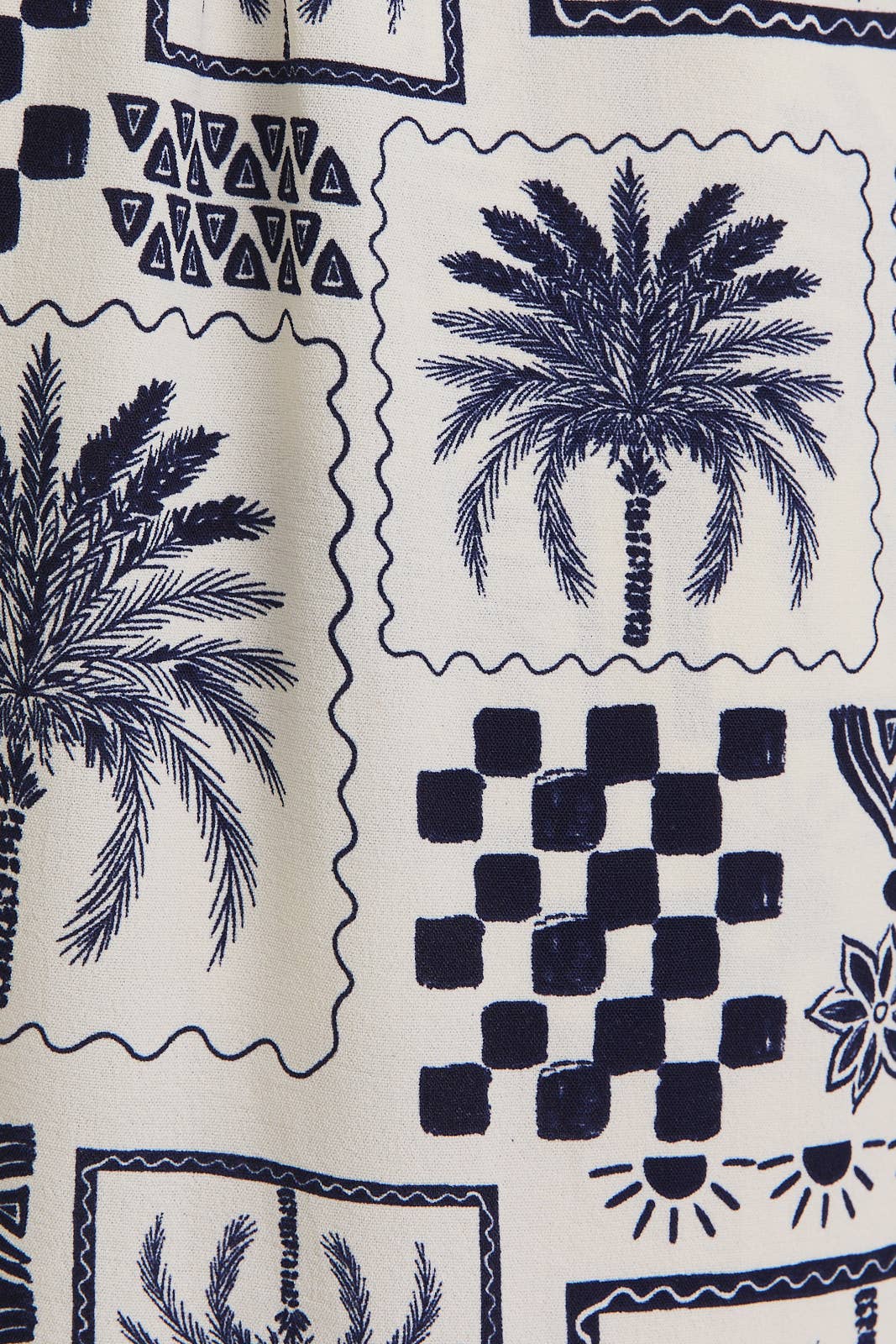 HALTER NECK STRAIGHT LEG ABSTRACT PRINT JUMPSUIT: IVORY-NAVY ABSTRACT